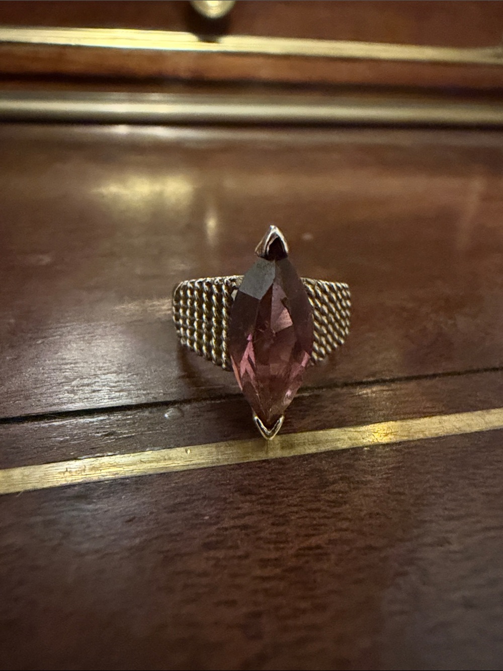 8k hge Ring with Marquise purple Stone